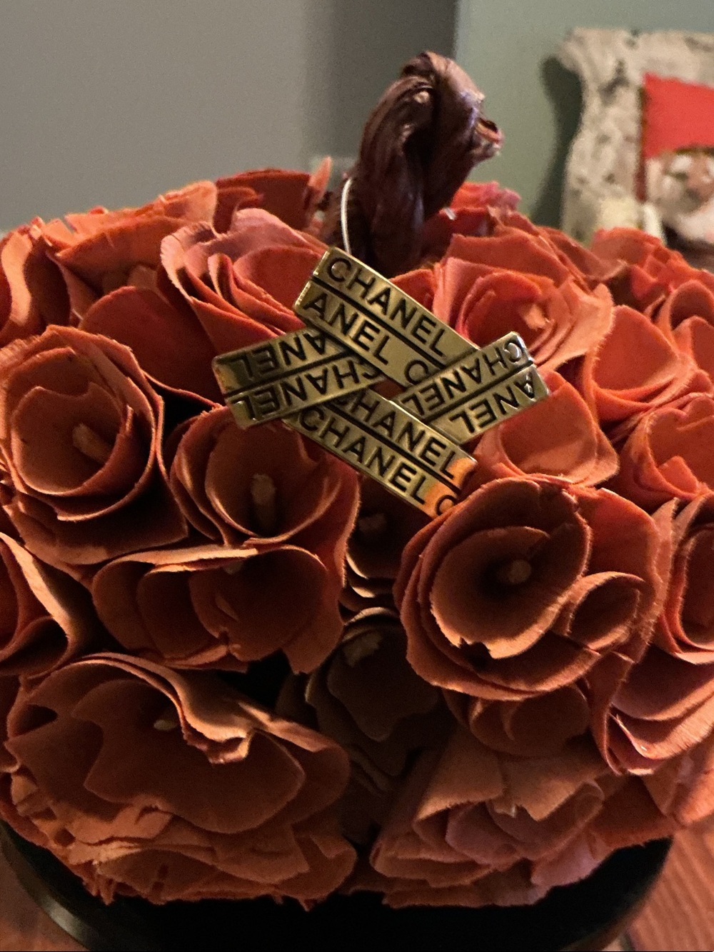 CHANEL Gold-Tone Logo Accent on Orange Floral Cluster